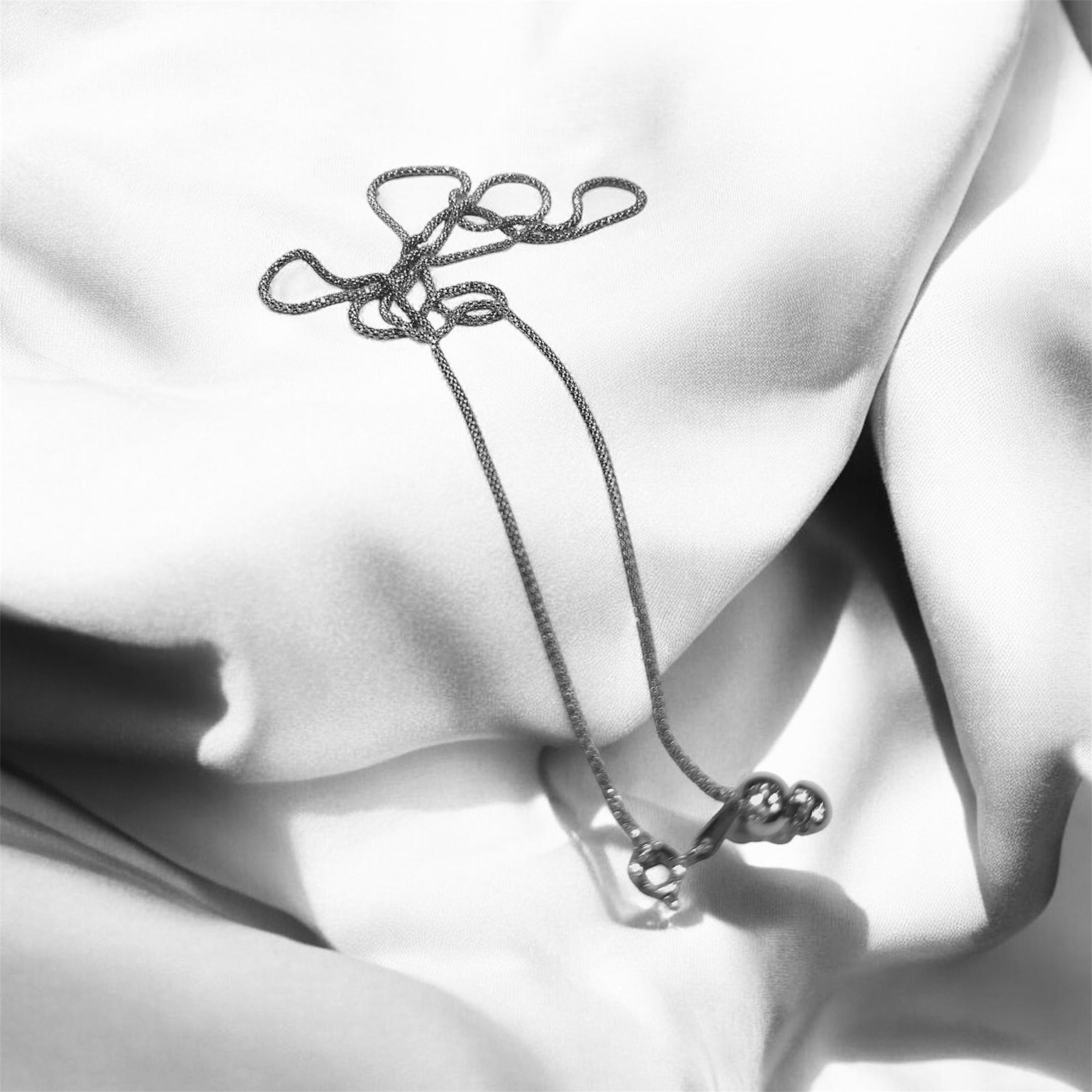 "LOOSE ROPE CHAIN"