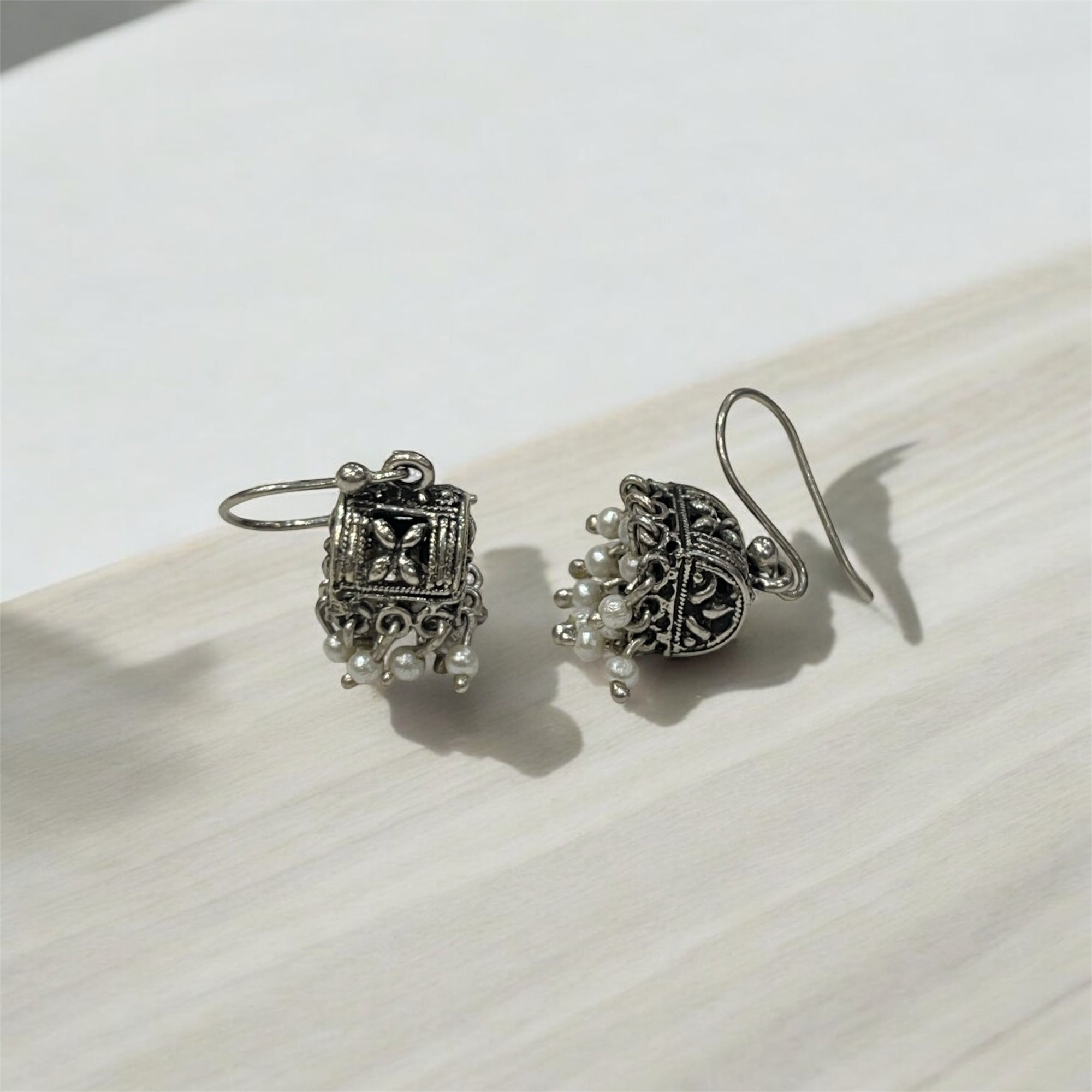 "PEARL CASCADE EARRINGS"